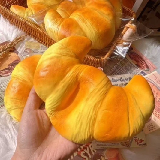 Croissant-Squishy-Stressball – Weiches Klebriges Slow-Rising Brot-Knautsch-, Fidget- & Sensorikspielzeug für Entspannung & Partygeschenke