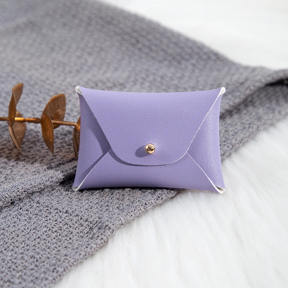 100 Stück Silberne Schmuckbeutel mit Logo – 10x7cm Lederbeutel mit Kordelzug | Für Ohrringe, Ringe, Halsketten, Münzen & Schlüsselanhänger Kaufschwan®
