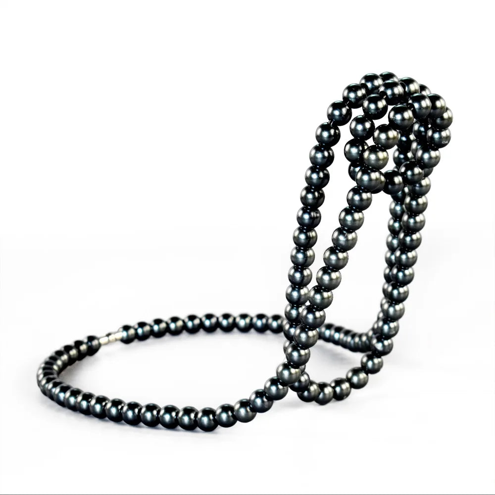 Metall Weinflaschenhalter – Kreatives Schwebendes Design mit Perlenkette | Eleganter Flaschenständer für Rotwein & Deko Kaufschwan® Schwarz