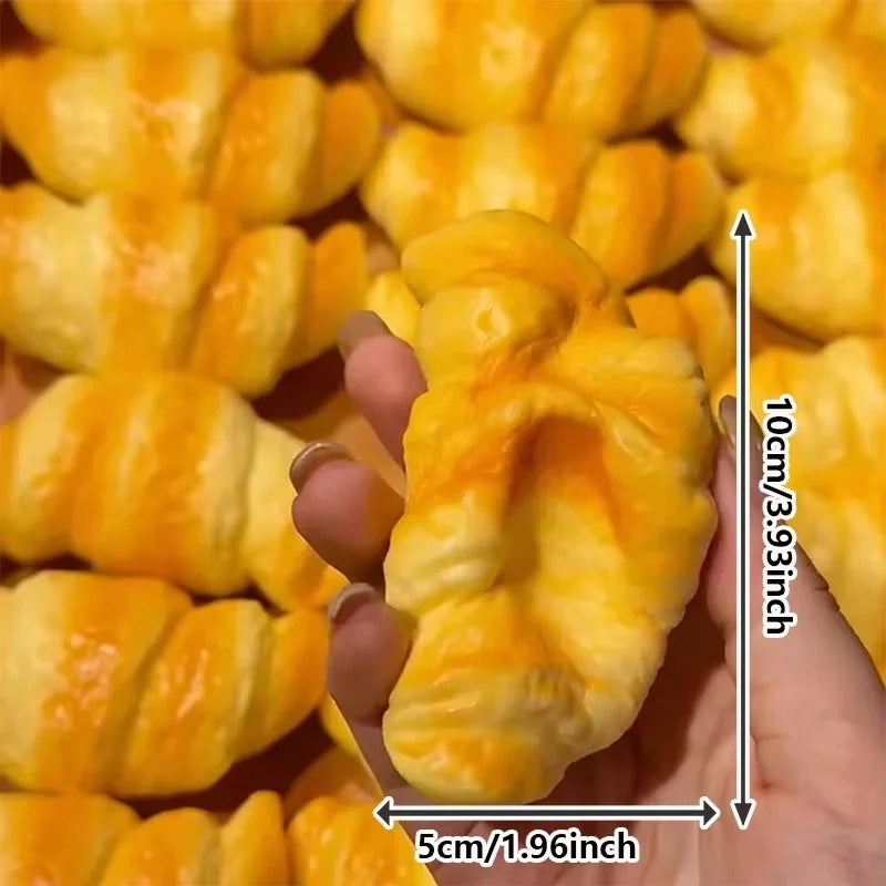 Croissant-Squishy-Stressball – Weiches Klebriges Slow-Rising Brot-Knautsch-, Fidget- & Sensorikspielzeug für Entspannung & Partygeschenke