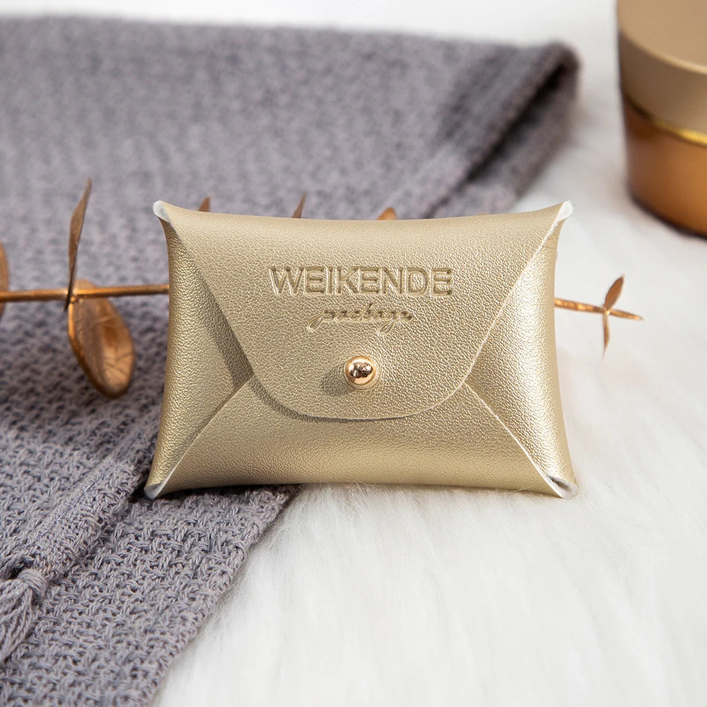 100 Stück Silberne Schmuckbeutel mit Logo – 10x7cm Lederbeutel mit Kordelzug | Für Ohrringe, Ringe, Halsketten, Münzen & Schlüsselanhänger Kaufschwan® Gold 10x7cm